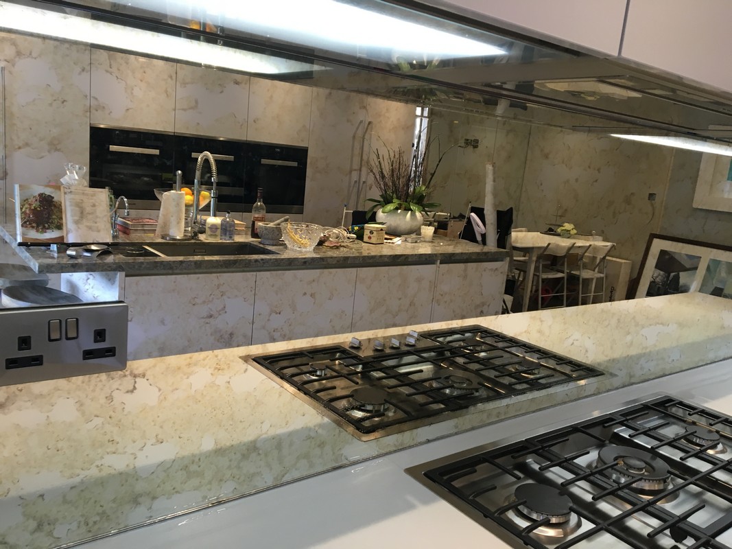 Mirror glass splashback in Slough luxury kitchen